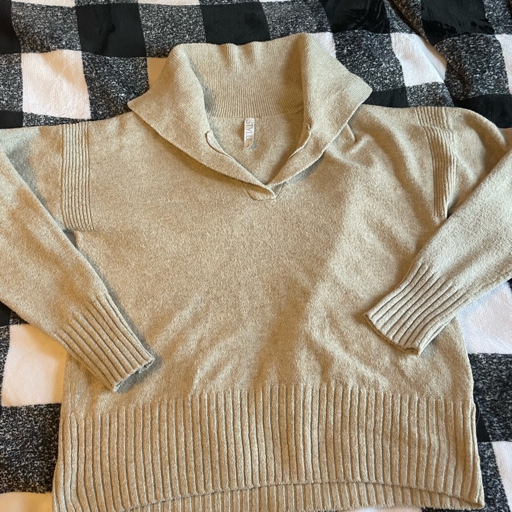 warm women’s sweater (new condition)